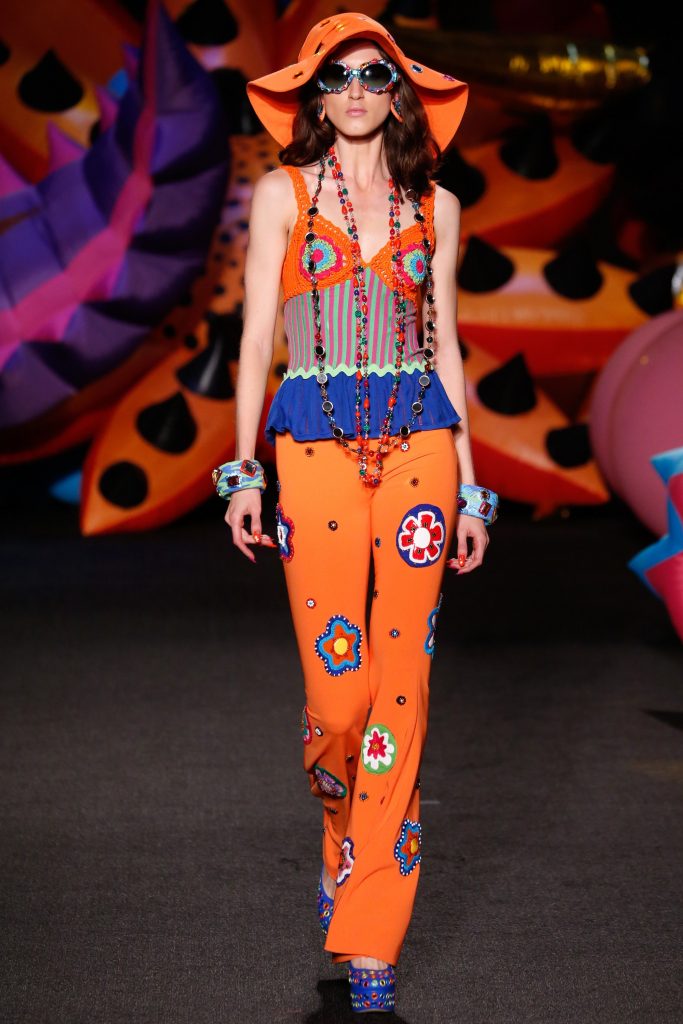 Orange pants flowers and necklace